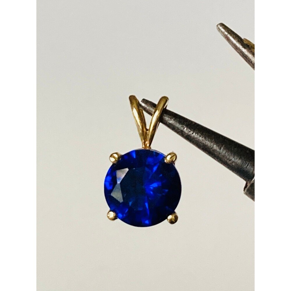 Tested 14k gold genuine blue topaz Pendant